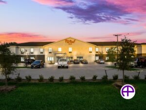 Twilight photo of commercial real estate enhanced using accuskyreplacements™ service