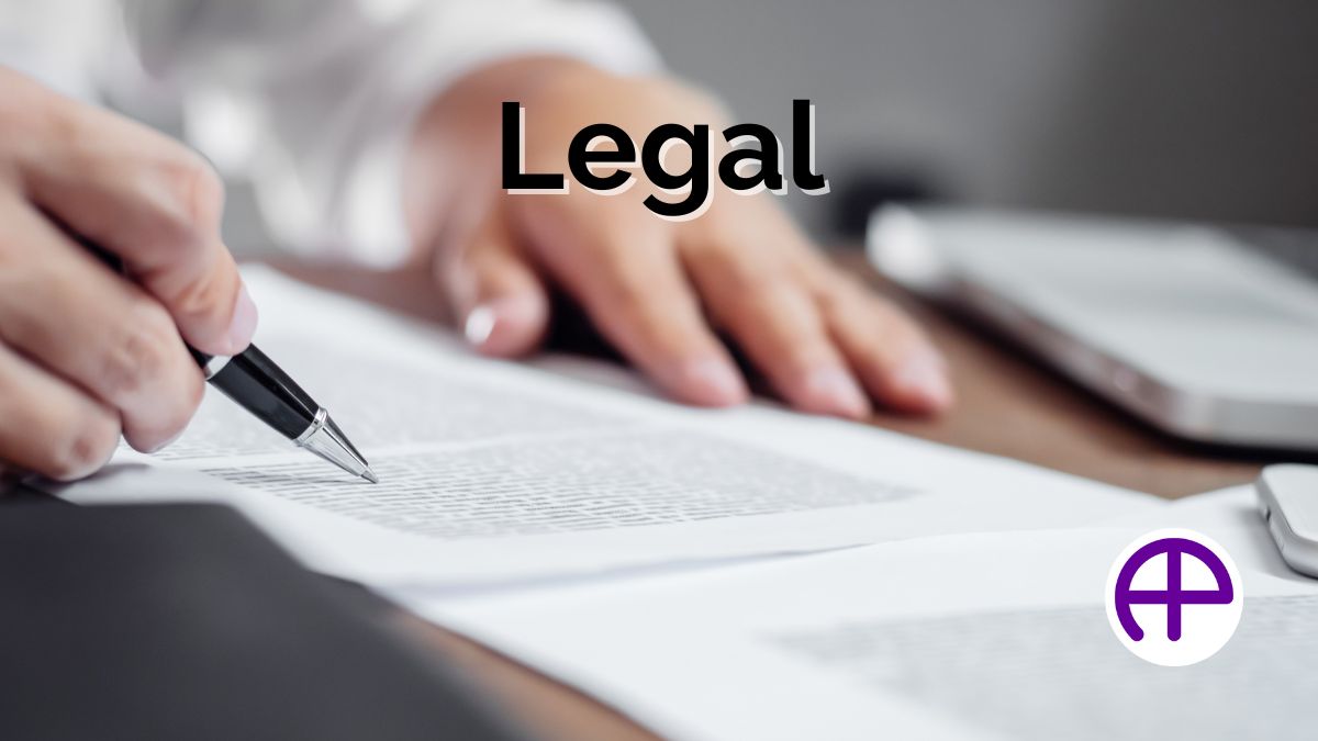 Legal Document Review Image Person reviewing legal documents at desk