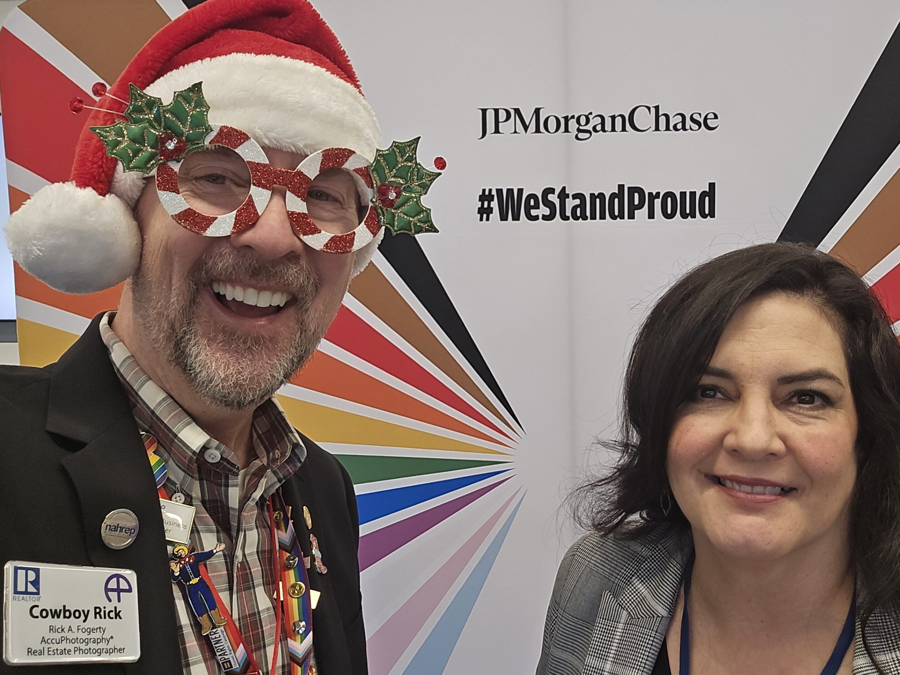 Rick A. Fogerty And Sylvia Andrade At Chase Pride Showcase Rick a. Fogerty and sylvia andrade in front of the jpmorgan chase #westandproud backdrop at the chase pride showcase in plano.